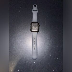 Apple Watch Series 3 38mm with a bundle of watch bands included.